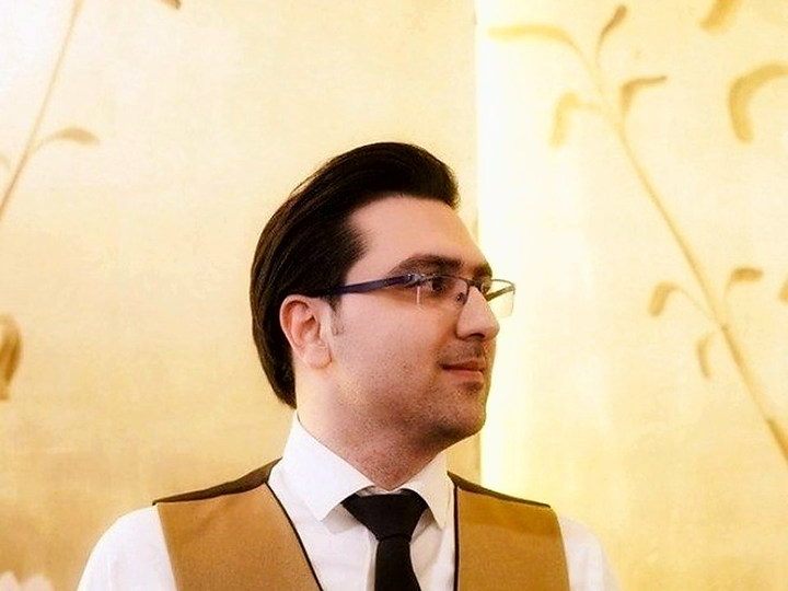 Omid in a professional leadership setting